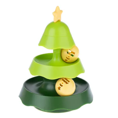 Green toy shaped like a Christmas tree with two yellow balls, decorated with star and stripe patterns.