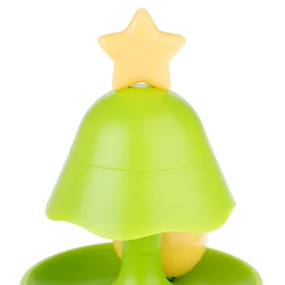Green toy in the shape of a tree with a yellow star on top, suitable for interactive play.