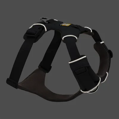 Black dog harness with reflective stripes, adjustable straps and metal rings for leash attachment.
