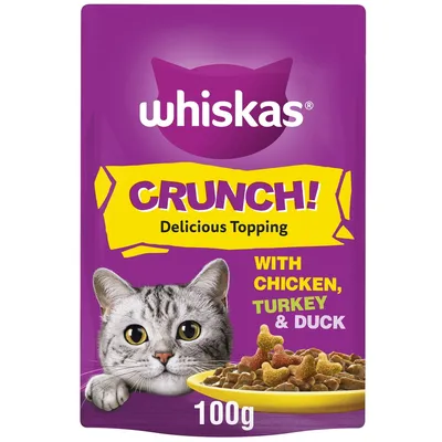 Crunch delicious topping with chicken, turkey and duck, 100g pack. Image shows food pieces in a bowl.