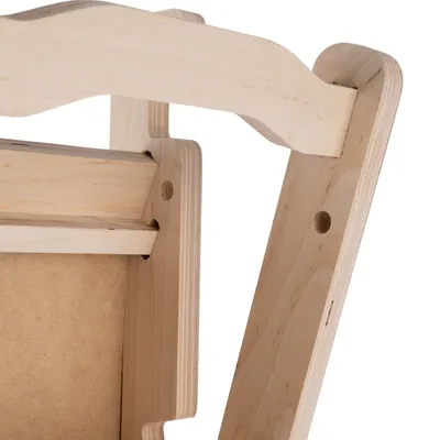 Close-up of a wooden frame with a smooth surface and pre-drilled holes, suitable for assembly or accessory attachment.