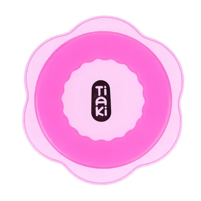 Tiaki pink bowl with flower-shaped design, suitable for pet food or water.