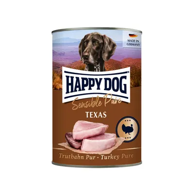Happy Dog Sensible Pure Texas, pure turkey. Made in Germany. Image of turkey meat and dog in front of landscape background.