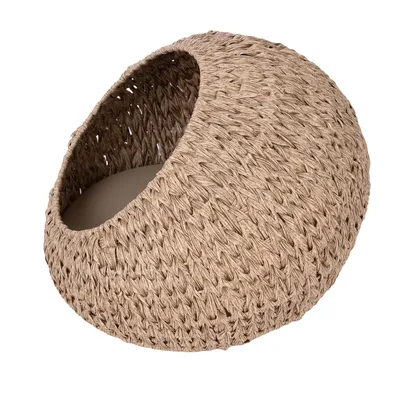 Niche ronde en osier tressé avec grande ouverture, intérieur visible sans coussin ni accessoire, matériau naturel apparent.