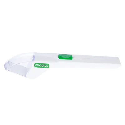 Zooplus kaparófa-javító eszköz átlátszó műanyag fejjel és zöld csúszkával.