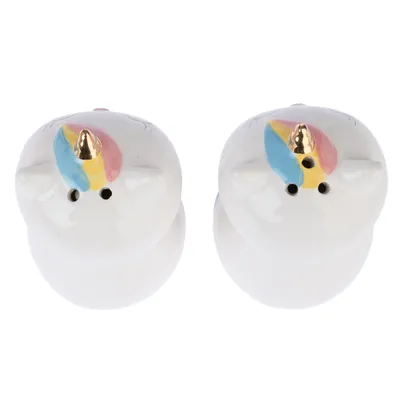 Deux récipients en céramique blanche en forme de têtes de licorne avec corne dorée et crinière colorée, vue du dessus. Aucun texte ou marque visible.