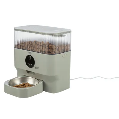 Automatic feeder by Trixie with transparent container for dry food, stainless steel food bowl and control buttons. Cable connection visible.