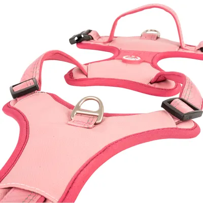 Roze hondentuigje met verstelbare banden, metalen ring voor lijn en handvat bovenop. Geschikt voor veilige grip en controle.