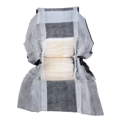 Vue d'une couche absorbante ouverte pour animaux, intérieur en tissu blanc et gris, bords élastiqués visibles.