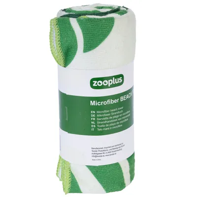 Zooplus toalha de praia em microfibra, verde e branco, descrição do produto multilingue na embalagem. Fabricado na China.