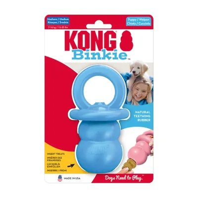 Jouet KONG Binkie bleu pour chiot, caoutchouc naturel, taille medium 7–16 kg, insert friandises, texte visible : Natural Teething Rubber, Made in USA, Dogs Need to Play.