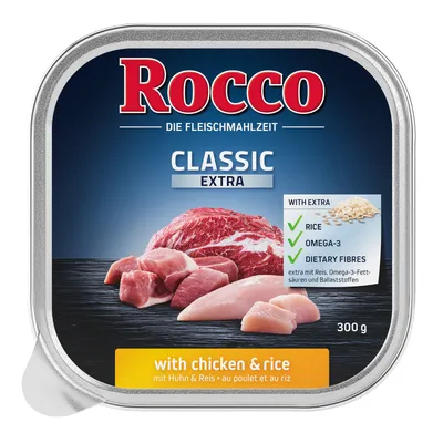 Консерва Rocco Classic Extra 300 г, с курицей и рисом. На упаковке: мясо, надписи 'with chicken & rice', 'rice', 'omega-3', 'dietary fibres'.