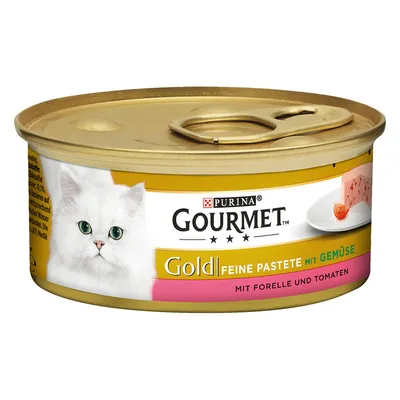 Purina Gourmet Gold нежный паштет с овощами, с форелью и томатами. На изображении золотая банка с белой кошкой и изображением продукта.
