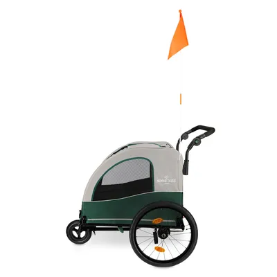 Nomad Tales Fahrradanhänger mit zwei Rädern, grün-graues Design, Netzfenster und orangefarbene Sicherheitsflagge.