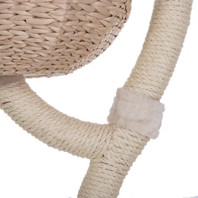 Detailed view of a scratching post element made from sisal rope and woven natural material, with a plush cover at the connecting piece. Detailed view of a scratching post element made from sisal rope and woven natural material, with a plush cover at the connecting piece.
