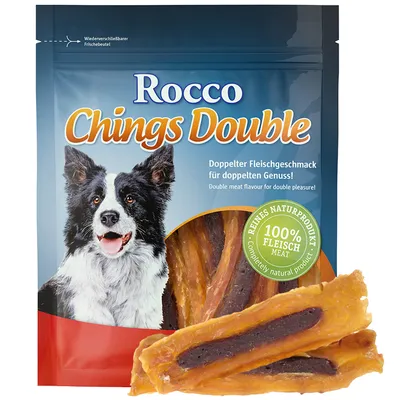 Pachet Rocco Chings Double cu imagine de câine, text vizibil: '100% Fleisch Meat', 'Doppelter Fleischgeschmack für doppelten Genuss!', felii de carne uscată vizibile prin ambalaj.