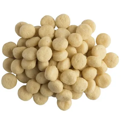 Crocchette rotonde di colore chiaro, disposte in un mucchio. Nessun marchio o testo visibile sull'immagine.