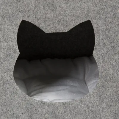 Grey felt material with cat-shaped cut-out, visible white padding behind.