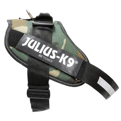 Pettorina per cani Julius-K9 IDC Power con motivo mimetico, scritta visibile 'JULIUS-K9 IDC® POWER', fibbie e anello in metallo.