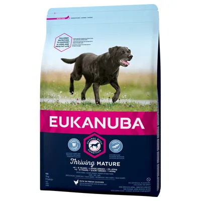 Saco de pienso Eukanuba Thriving Mature para perros, con imagen de perro negro corriendo. Texto visible: 'Optimal Body Condition', '+6 años razas grandes 25–40 kg, +8 años razas gigantes >40 kg'.