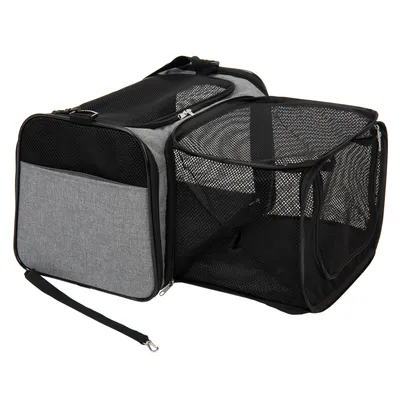Sac de transport pour animaux en tissu gris et noir, avec panneaux en maille, poche latérale, poignée et sangle amovible visibles.