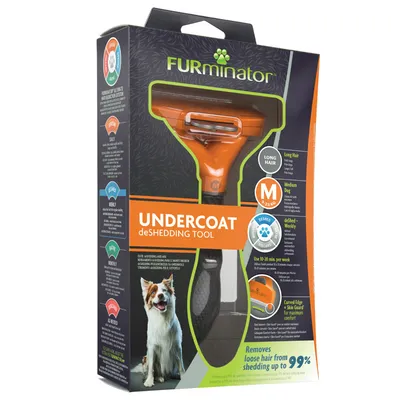 FURminator Undercoat deShedding Tool til mellemstore hunde 9–23 kg, lang pels. Tekst: Removes loose hair from shedding up to 99 %. Billede af børste og hund på emballagen.