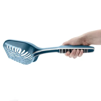 Hand holding a blue cat litter scoop with ergonomic handle and slots for easy cleaning.