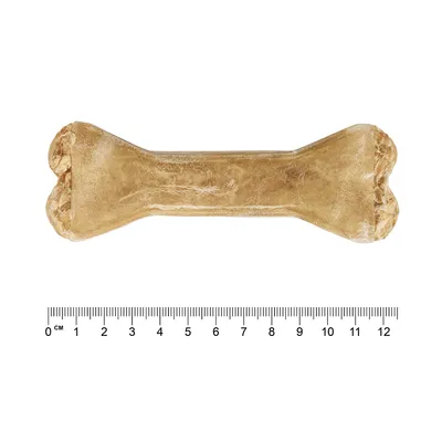 Knogler af presset oksehud, længde ca. 12 cm, centimeter-skala synlig.