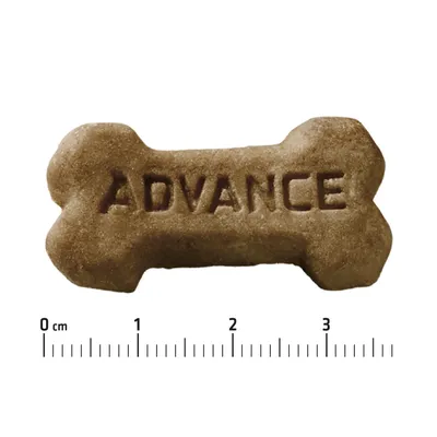 Bone-shaped biscuit with ADVANCE embossed on it, shown above a ruler in centimetres from 0 to 4 cm for size reference.