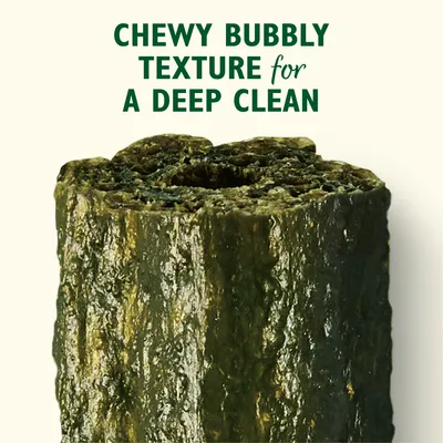 Chewy bubbly texture for a deep clean, shown on a close-up of a treat with a porous surface.