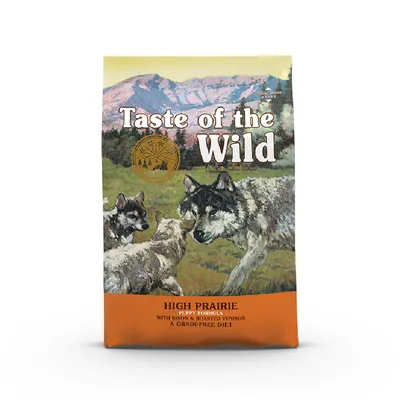 Taste of the Wild High Prairie Puppy Formula, con bisonte e cervo arrosto, dieta senza cereali. Testo in inglese sulla confezione.
