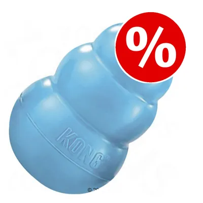 Juguete azul para perros con la marca KONG visible y símbolo de porcentaje en círculo rojo, indicando oferta o descuento.