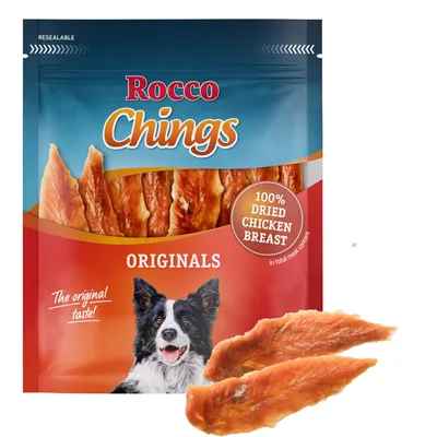 Rocco Chings Originals, 100% sušená kuřecí prsa, znovuuzavíratelný obal. Na obrázku: pes a produkt.