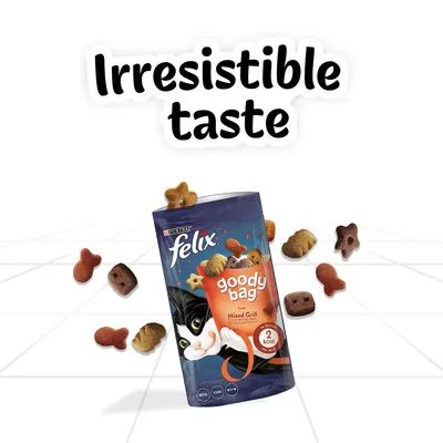 Felix goody bag mixed grill treats with text 'Irresistible taste' and '2 kcal per treat' shown on the packaging, surrounded by various shaped treats.