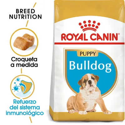 Royal Canin Puppy Bulldog. Croqueta a medida. Refuerzo del sistema inmunológico. Imagen de croqueta y cachorro bulldog en el envase.