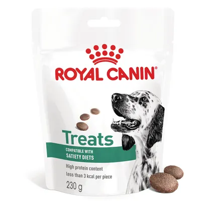 Royal Canin Treats, compatible with satiety diets, high protein content, less than 3 kcal per stuk, 230 g. Afbeelding van hond en enkele brokjes zichtbaar op de verpakking.