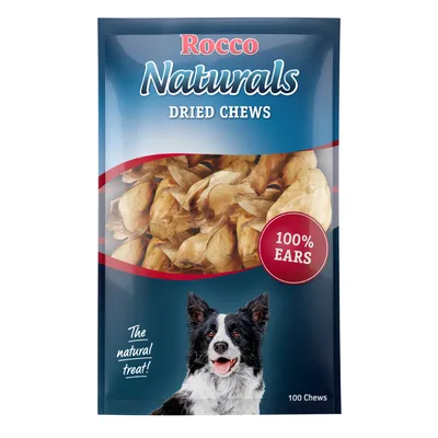 Rocco Naturals αποξηραμένες λιχουδιές, 100% αυτιά, 100 τεμάχια. Συσκευασία με αποξηραμένα προϊόντα μάσησης και εικόνα σκύλου.