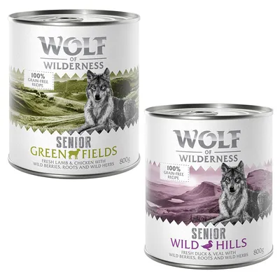 Dos latas de Wolf of Wilderness Senior, Green Fields y Wild Hills, 800 g cada una. Receta sin cereales. Textos: cordero y pollo fresco; pato y ternera fresca con bayas, raíces y hierbas silvestres.