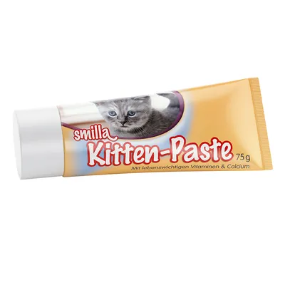 smilla Kitten-Paste 75 g, met levenswichtigen Vitaminen & Calcium. Tekst in het Duits: Mit lebenswichtigen Vitaminen & Calcium. Afbeelding van een grijze kitten op de verpakking.