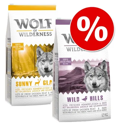 Wolf of Wilderness Sunny Glade a Wild Hills, 12 kg balenia, 100 % grain-free receptúra, akciová ponuka označená symbolom percenta na červenom pozadí.
