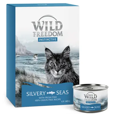 Wild Freedom Instinctive Silvery Seas, 6 x 140 g, avec poisson frais, recette sans céréales. Boîte et conserve visibles, image de chat sur l’emballage.