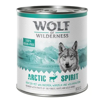 Lata de comida Wolf of Wilderness Arctic Spirit, 800 g. Texto visible: 100 % grain-free, reno con frutos del bosque, raíces y hierbas silvestres. Etiqueta en inglés y alemán.