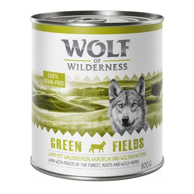 Lata de Wolf of Wilderness Green Fields, 800 g, 100% grain-free. Texto visible: 'Lamb with fruits of the forest, roots and wild herbs'.