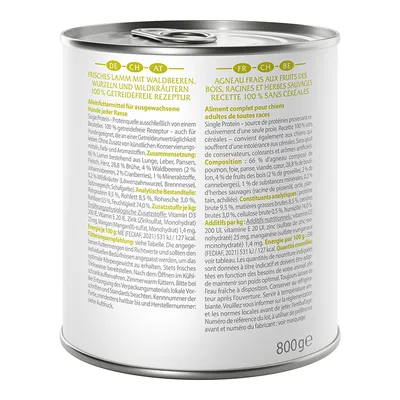 Tin labelled: Fresh lamb with forest berries, roots and wild herbs. 100% grain-free recipe. Complete food for adult dogs of all breeds. Content: 800g.