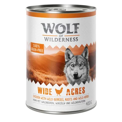 Lata de Wolf of Wilderness Wide Acres, 400 g, texto visible: 100% grain-free, chicken with wild berries, roots and wild herbs. Imagen de paisaje y lobo en la etiqueta. Lata de Wolf of Wilderness Wide Acres, 400 g, texto visible: 100% grain-free, chicken with wild berries, roots and wild herbs. Imagen de paisaje y lobo en la etiqueta.