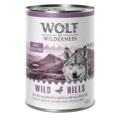 Wolf of Wilderness Wild Hills, 100% grain-free, can de 400 g. Texte visible : 'Ente mit Waldbeeren, Wurzeln und Wildkräutern'.