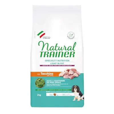 Zak Natural Trainer Specialty Nutrition Light in Fat hondenvoer, con Tacchino, 2 kg. Afbeelding van kalkoenstukjes en hond op de verpakking. Tekst deels in het Italiaans.