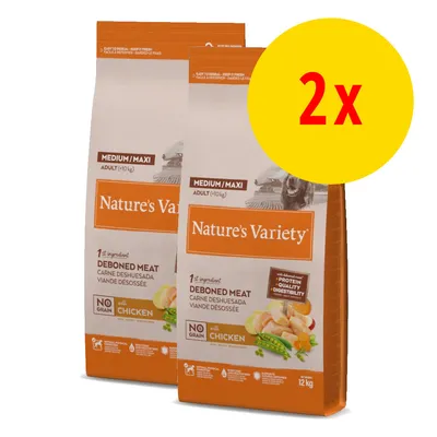 Lot de 2 sacs Nature’s Variety Medium/Maxi Adult (>10 kg), viande désossée, sans céréales, avec poulet, 12 kg chacun. Texte visible en anglais et français sur l’emballage.