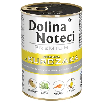 Conservă Dolina Noteci Premium, text vizibil: BOGATA w KURCZAKA, ryż brązowy, bazylia, marchew, olej lniany. Ambalaj cu imagini ale ingredientelor. Text în poloneză.