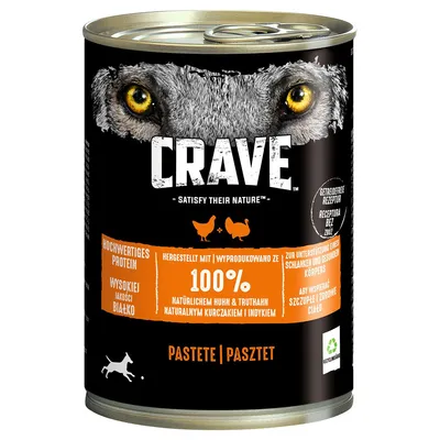 Lata de patê Crave para cães, com texto visível: 100% naturalnym kurczakiem i indykiem, proteína de alta qualidade, sem cereais. Imagem de olhos de lobo e silhueta de cão.